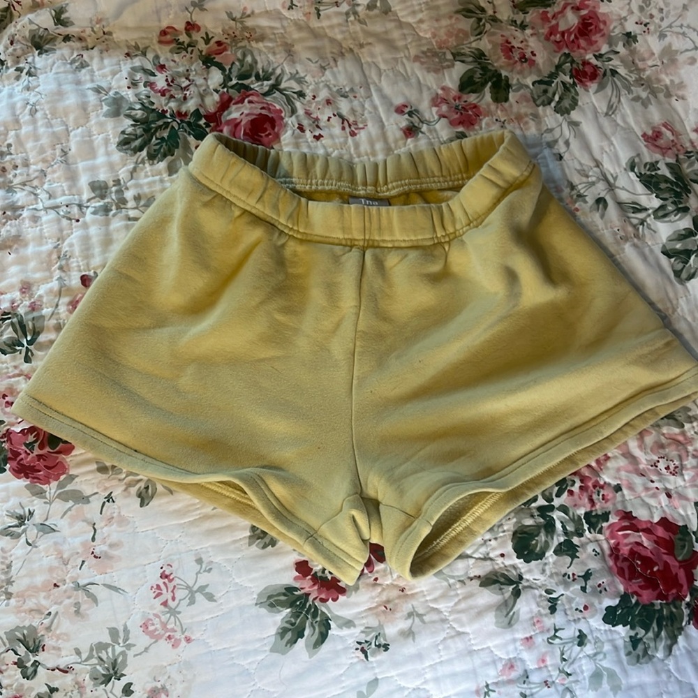 TNA yellow sweat shorts